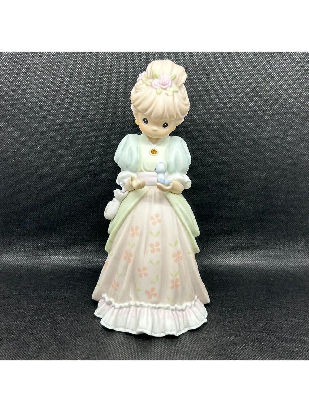Precious Moments "Charity Begins In The Heart" figurine